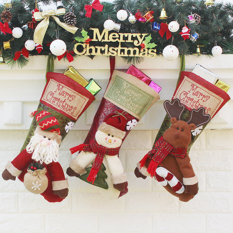 CHARACTER CHRISTMAS STOCKING (CHOICE OF SNOWMAN, ELK, OR SANTA CLAUS)