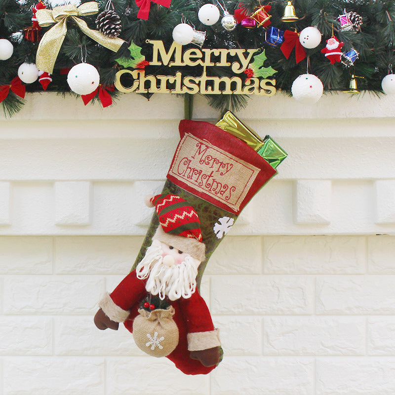 CHARACTER CHRISTMAS STOCKING (CHOICE OF SNOWMAN, ELK, OR SANTA CLAUS)